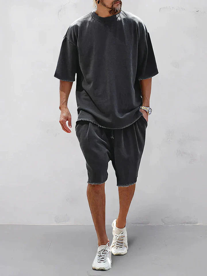 Herrars oversized set i grå. Trendigt och bekvämt set för avslappnad vardagsstil med komfort.