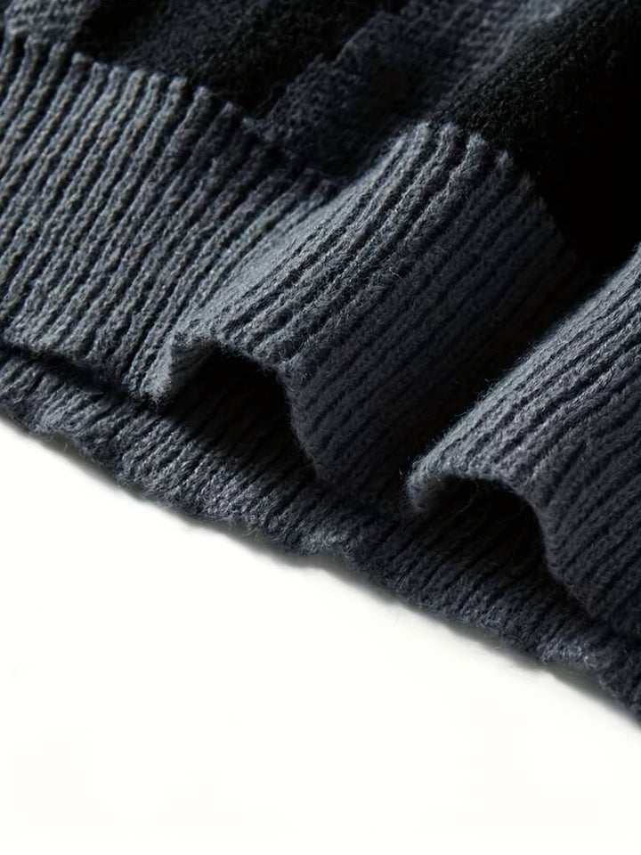 Stilren stickad herrtröja, idealisk för vardagsstil och höstmode.
