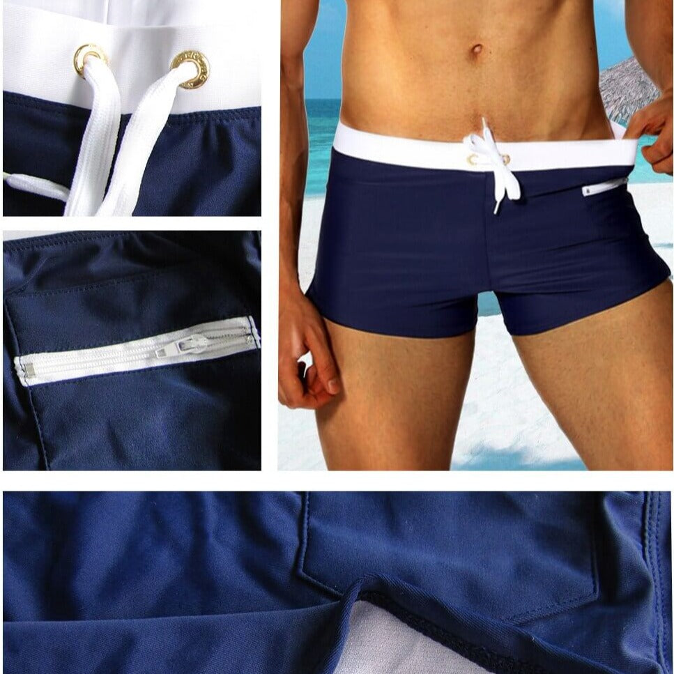 Sportiga herrsimshorts med dragsko, optimerade för vattensport och aktiv användning.