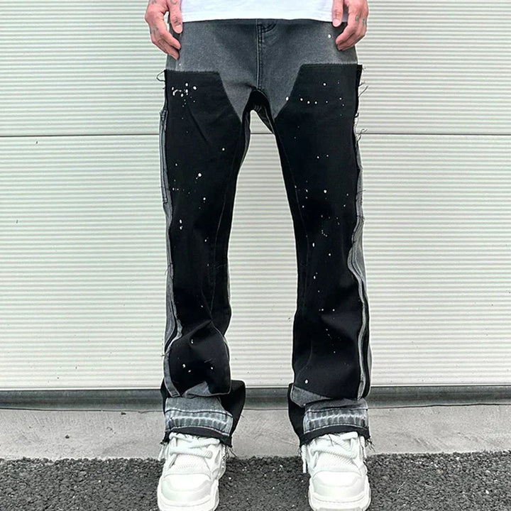 Avslappnade herrbyxor, retro streetwear-stil. Svarta/blå byxor med unikt mönster. Tidlösa & bekväma.
