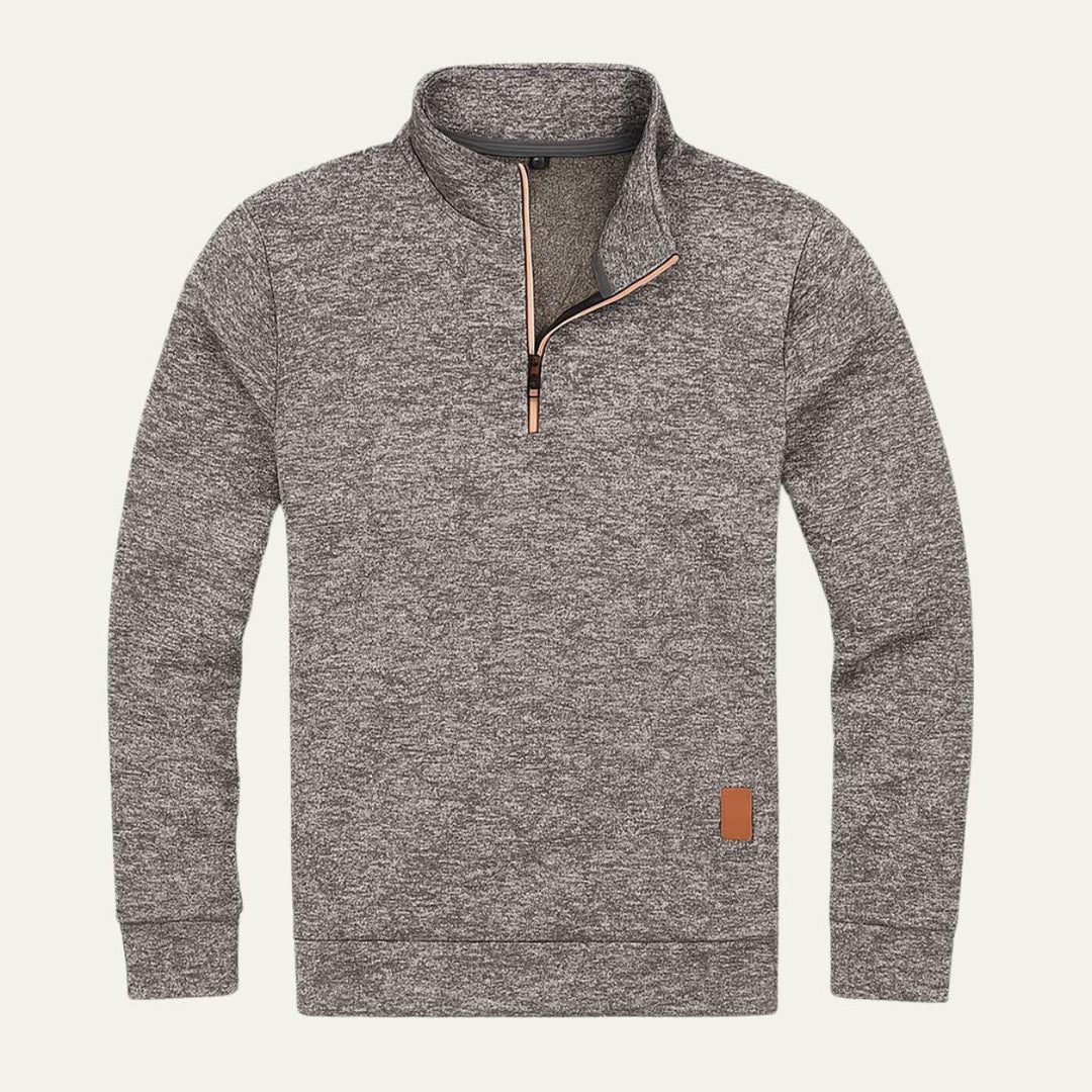 Värmande herrfleece med halv dragkedja. Idealisk för utomhusaktiviteter och sportig casual stil.