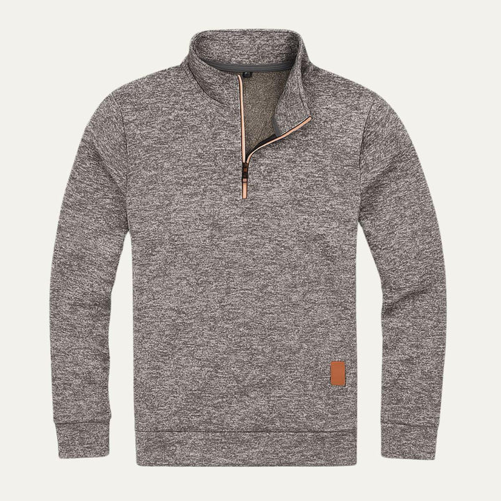 Värmande herrfleece med halv dragkedja. Idealisk för utomhusaktiviteter och sportig casual stil.