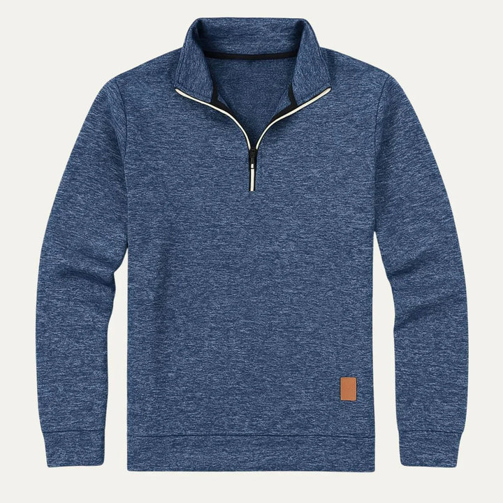 Stilren herrfleece med halv dragkedja. Perfekt som värmande mellanlager eller casual utomhusplagg.