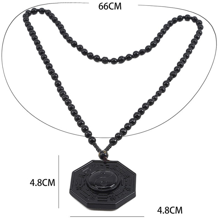 Herrhalsband av obsidian med Yin Yang, ger balans, skydd, energi & jordning.
