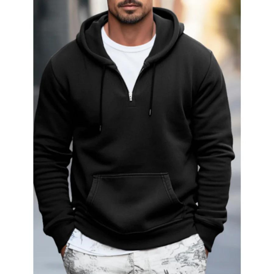 Snygg herrhoodie med känguruficka för streetstyle och fritid. Bekväm och modern design, idealisk för höst- och vårmode.