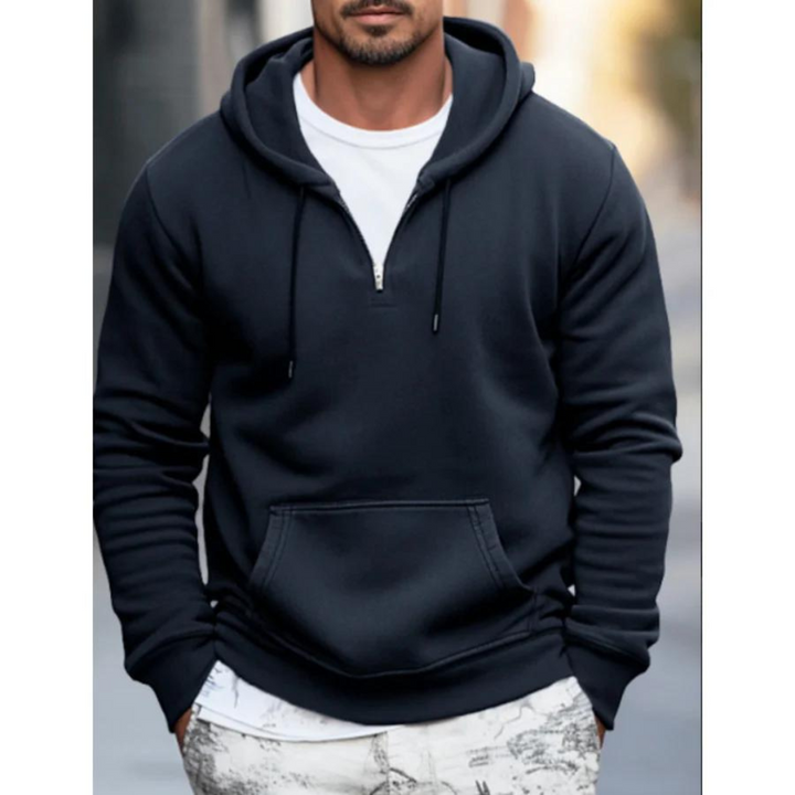 Minimalistisk herrhoodie med känguruficka, erbjuder komfort och stil. Perfekt för avslappnade herrkläder, vardag och fritid.