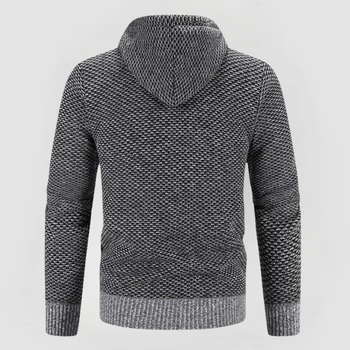 Grå herrhoodie i modern design, perfekt för en stilren och avslappnad vardagslook.