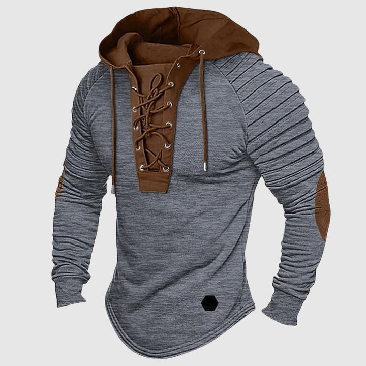 Stilren huvtröja för herr med snörningsdetalj, idealisk för sportig look och vardagsbruk. Bekväm passform.