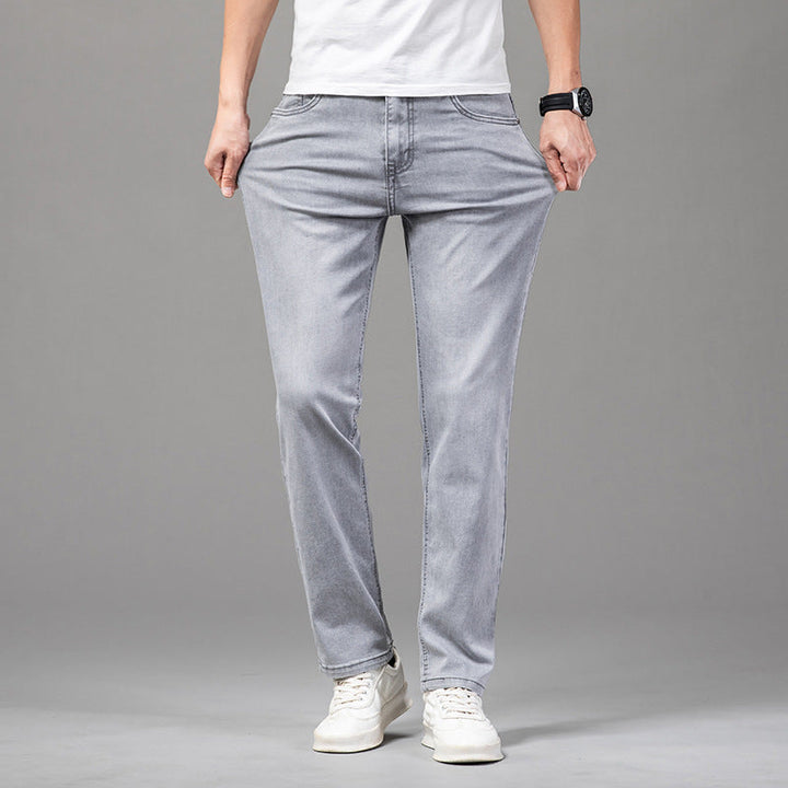 Stilrena herrjeans, hög midja & rak passform, erbjuder överlägsen komfort och stil.