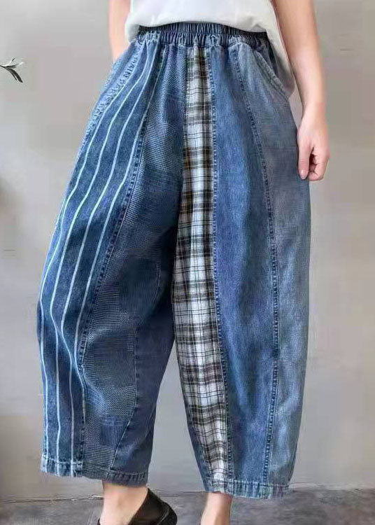 Herrjeans i blått med distinkt patchwork, perfekt för dig som söker unikt mode och bekvämlighet.