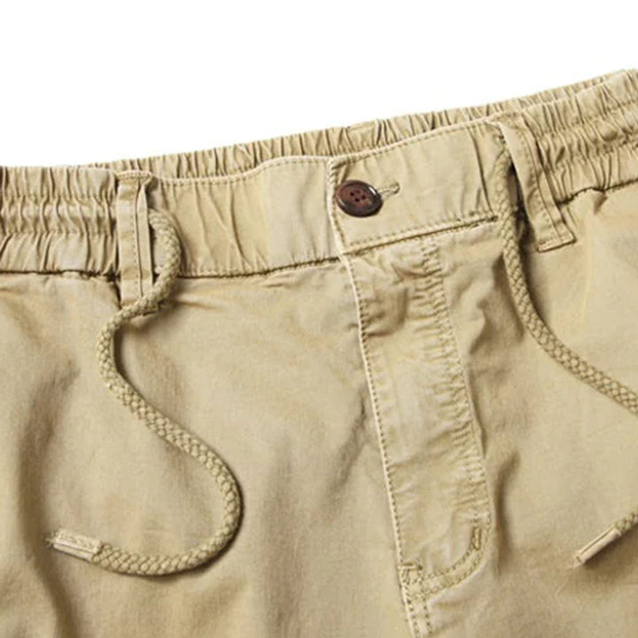 Mångsidiga herrjoggers med elastisk midja. Utmärkta som sportbyxor eller avslappnade vardagsbyxor.