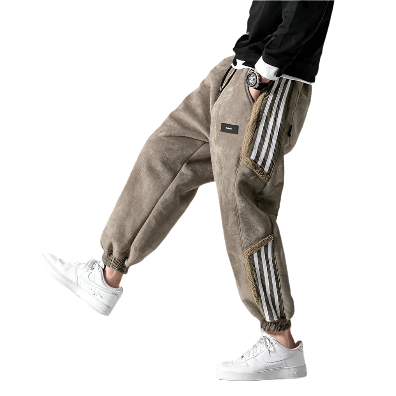 Herrjoggers med sidosträckning för stilren komfort. Bekväma casual byxor, perfekta för vardagen.