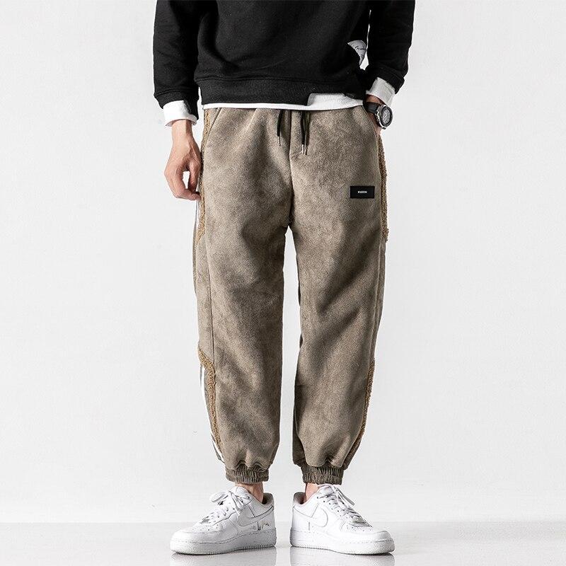 Moderna herrjoggers med sidosträckning, designade för optimal komfort och rörlighet i vardagen.