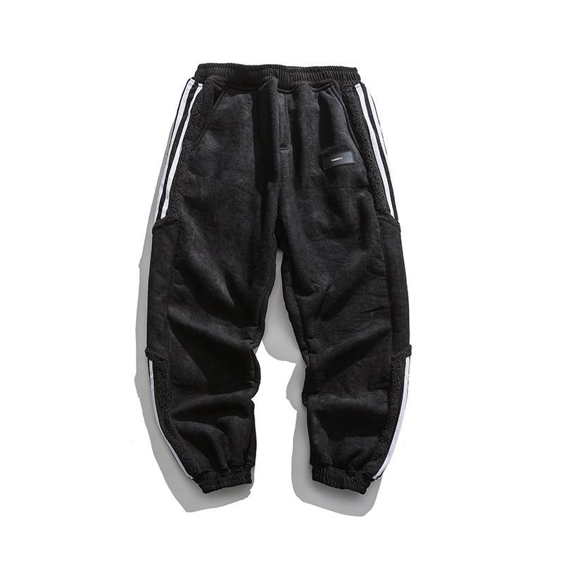 Herrjoggers med sidosträckning, perfekta för en aktiv livsstil. Stilrena fritidsbyxor i trendig design.