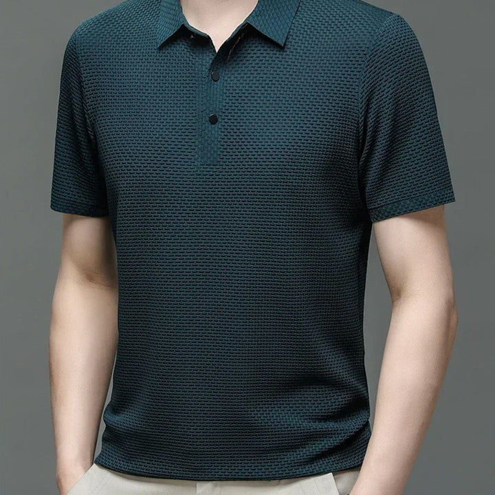 Herr Polo T-shirt som är lätt, andningsbar och bekväm för en tidlös stil. Perfekt för sommar.