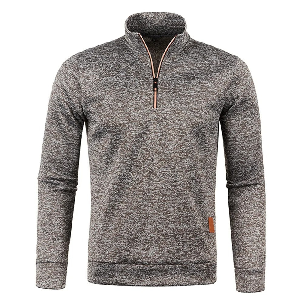 Grå herrtröja med dragkedja. Varm och stilren pullover för alla tillfällen.