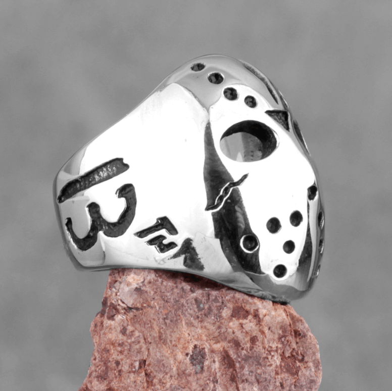 Sidovy av Jasonmask herrringen, visar den robusta designen i rostfritt stål.