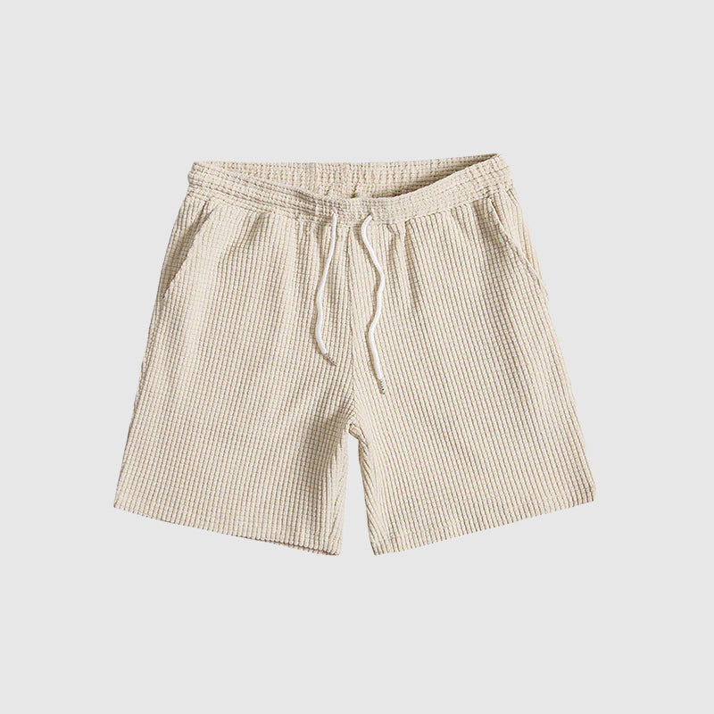 Herrkläder: Kortärmad skjorta och shorts set för optimal komfort. Perfekt för sommar och avkoppling.