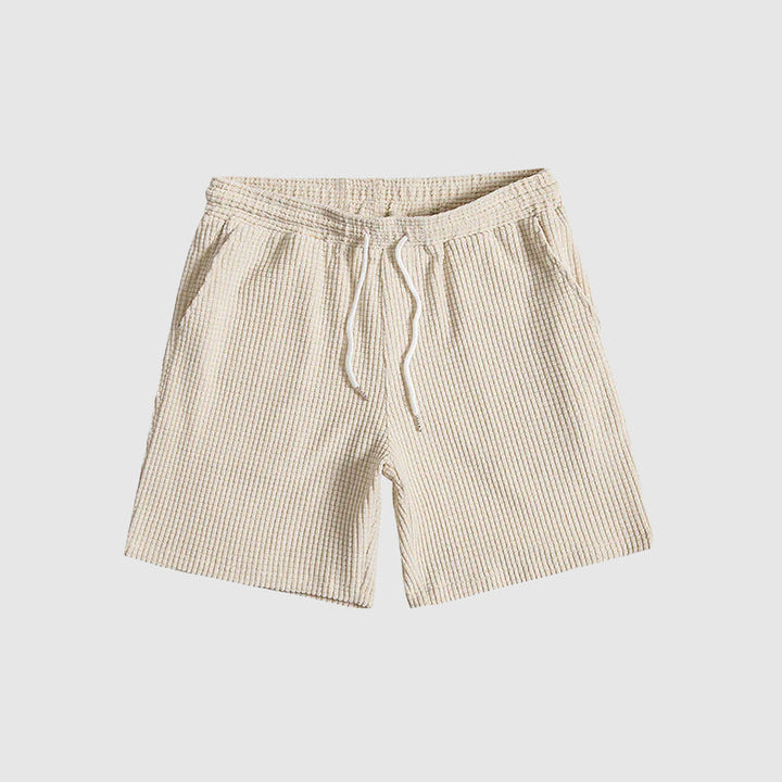 Herrkläder: Kortärmad skjorta och shorts set för optimal komfort. Perfekt för sommar och avkoppling.