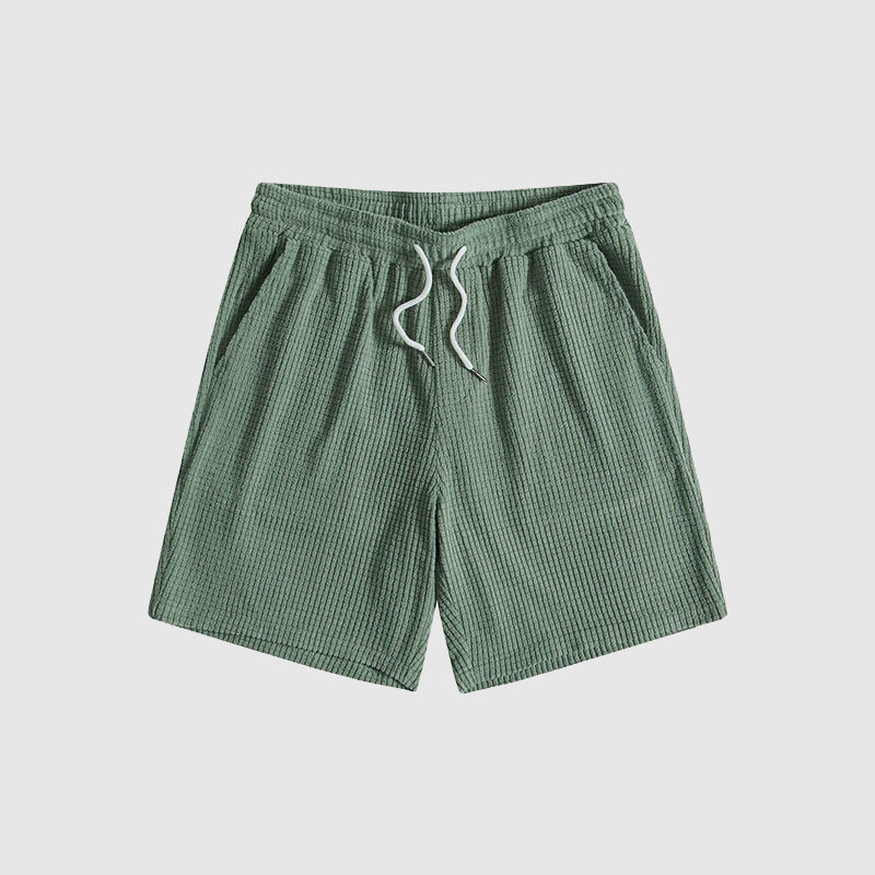Herrset med kortärmad skjorta och shorts, en del av den nya herrmodekollektionen för casual stil.