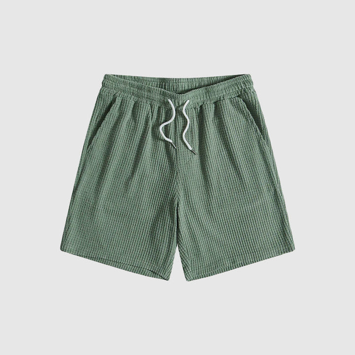 Herrset med kortärmad skjorta och shorts, en del av den nya herrmodekollektionen för casual stil.