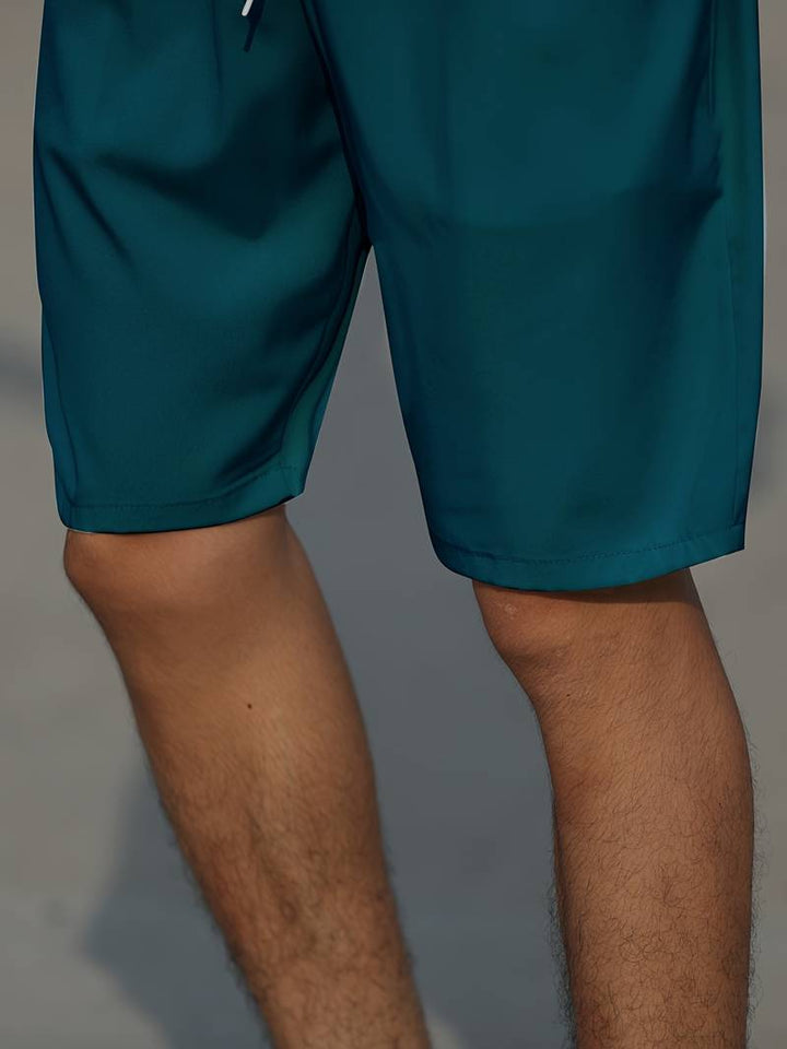 Avslappnade herrshorts med justerbar snörning, bekväma fritidsshorts för sommaren.