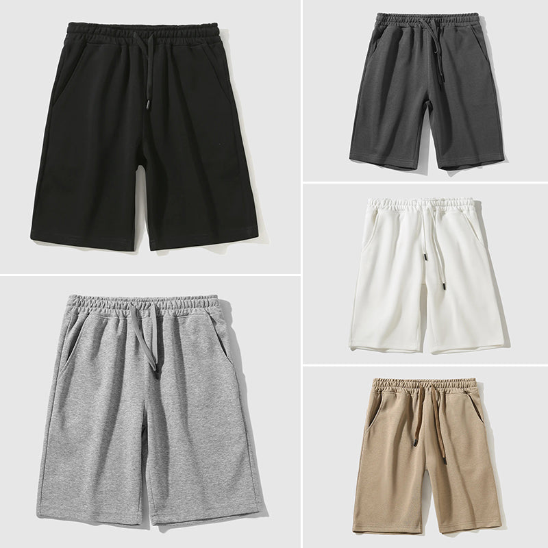 Sommarshorts för män: knälånga fritidsshorts med avslappnad passform och bekväm design.