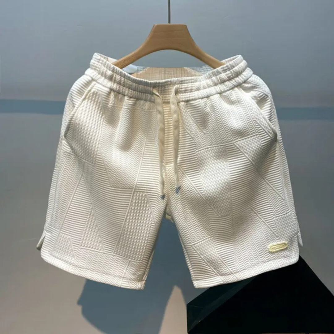 Stilrena herrshorts med vågmönster; perfekta fritidsshorts som passar både strand och sommaraktiviteter.