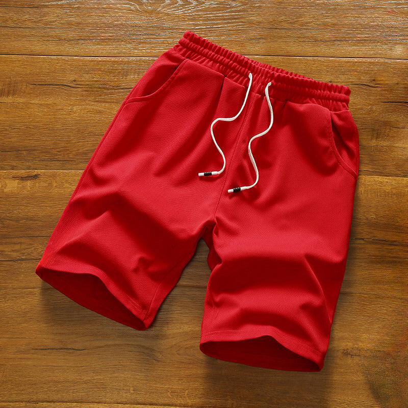 Baksida av Herrshorts Tropic Breeze visar praktiska fickor. Mjuka fritidsshorts för sommarmode.