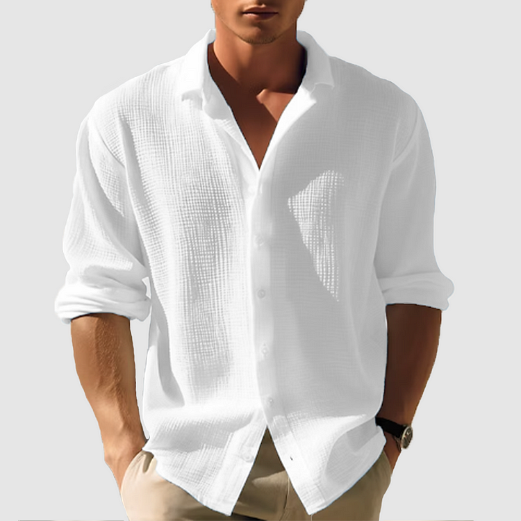 Elegant långärmad herrskjorta med button-down krage, perfekt för kontor & business casual.