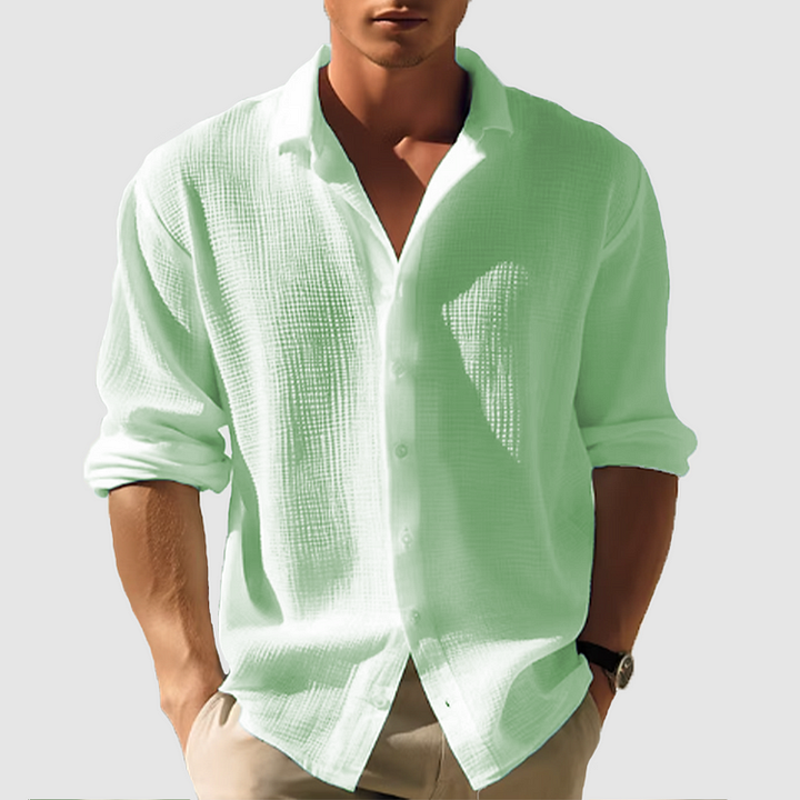 Enkel, mångsidig herrskjorta med button-down. Långärmad, passar för vardag & mer formella tillfällen.