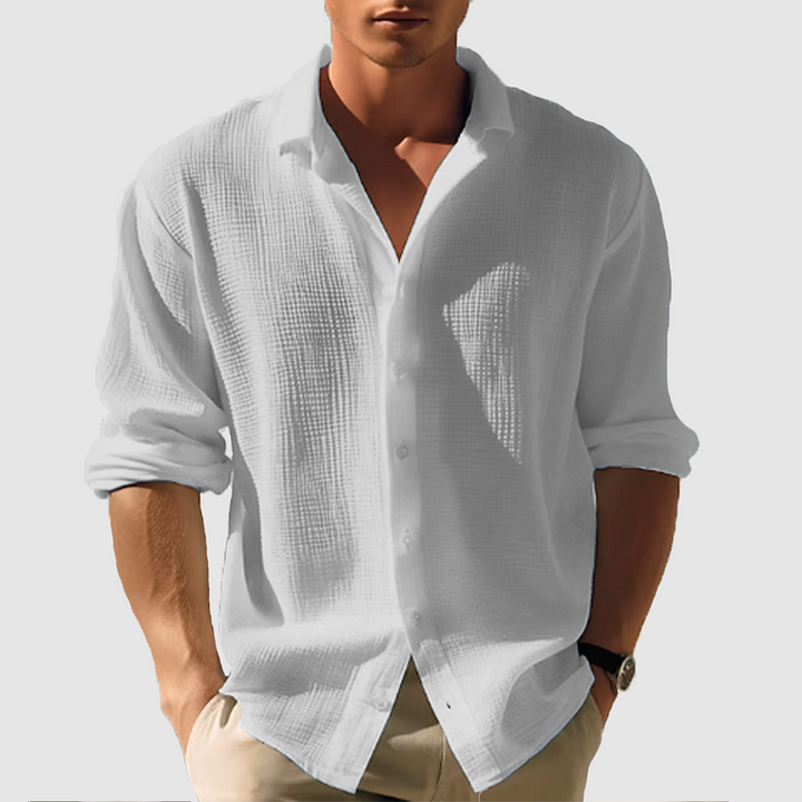 Herrmode: Långärmad button-down skjorta i enkel design, ett måste för stilren vardags- & kontorsstil.