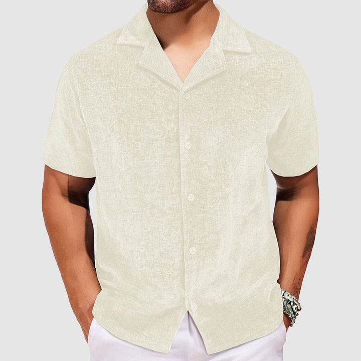 Klassisk retro knappskjorta för män. Avslappnad stil med tidlös elegans, perfekt för en bekväm och mångsidig look.