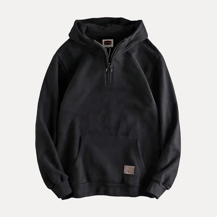 Stilren långärmad herrtröja med praktisk halvdragkedja, passar perfekt för casual looks och vardagsmode.