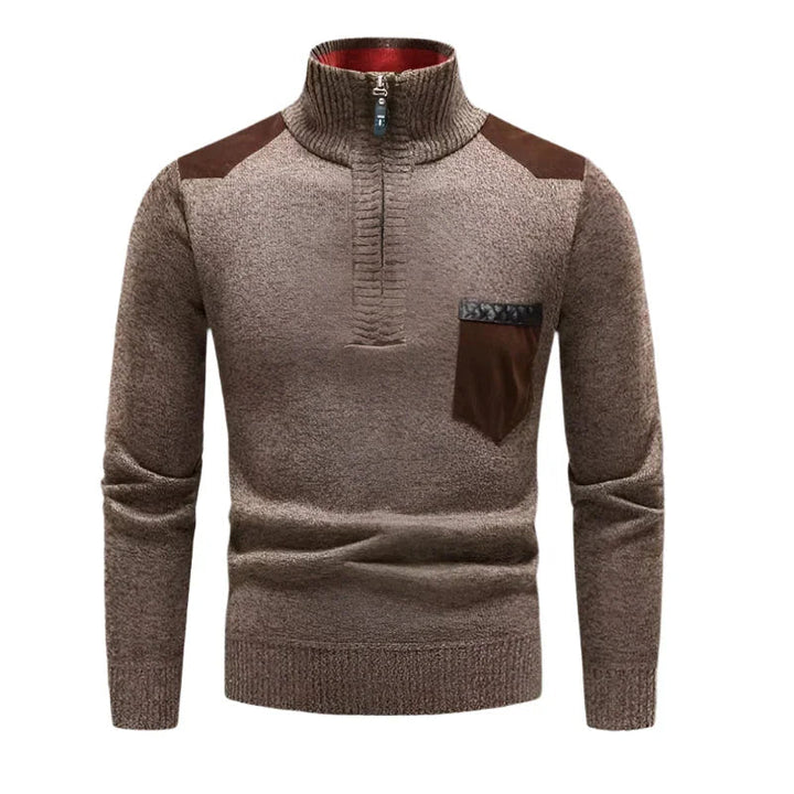 Herrtröja med halv dragkedja och stilrent patchwork i fuskmocka. Perfekt vardagströja för höstmode.