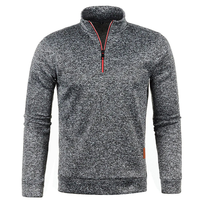 Varm, stickad herrtröja med hög polokrage. Idealisk för vinter och kalla dagar. Herrmode.