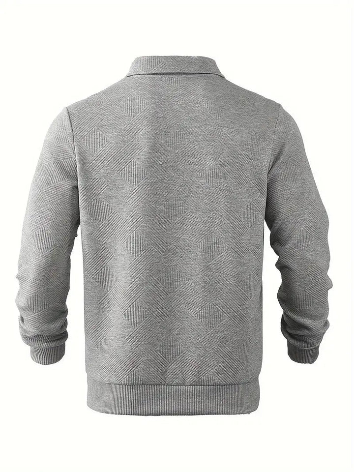 Komfortabel herrtröja med rund hals. Skräddarsydd passform ger en stilren look för kontoret.