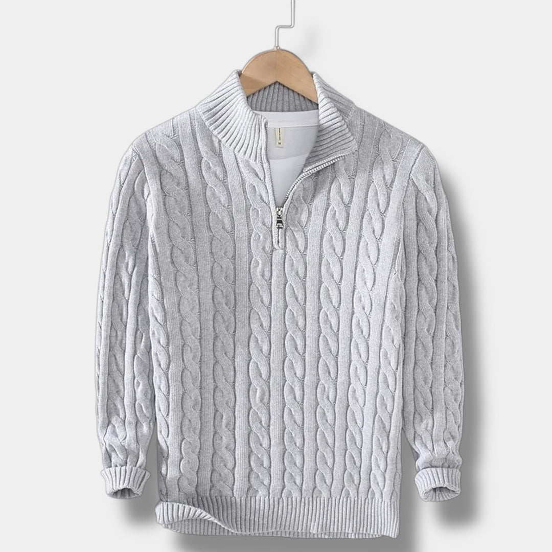 Stilren herrtröja i jacquardstickning. Modern mockneck för en sofistikerad look.