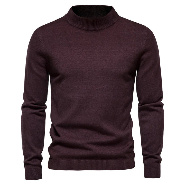 Vintermode: Stilren herrtröja med halvhög krage, varmrutig för en elegant look.