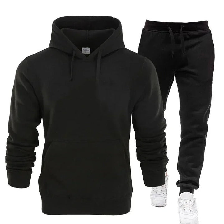 Herrträningsset i polyester: marinblå huvtröja & matchande joggingbyxor för gymmet.