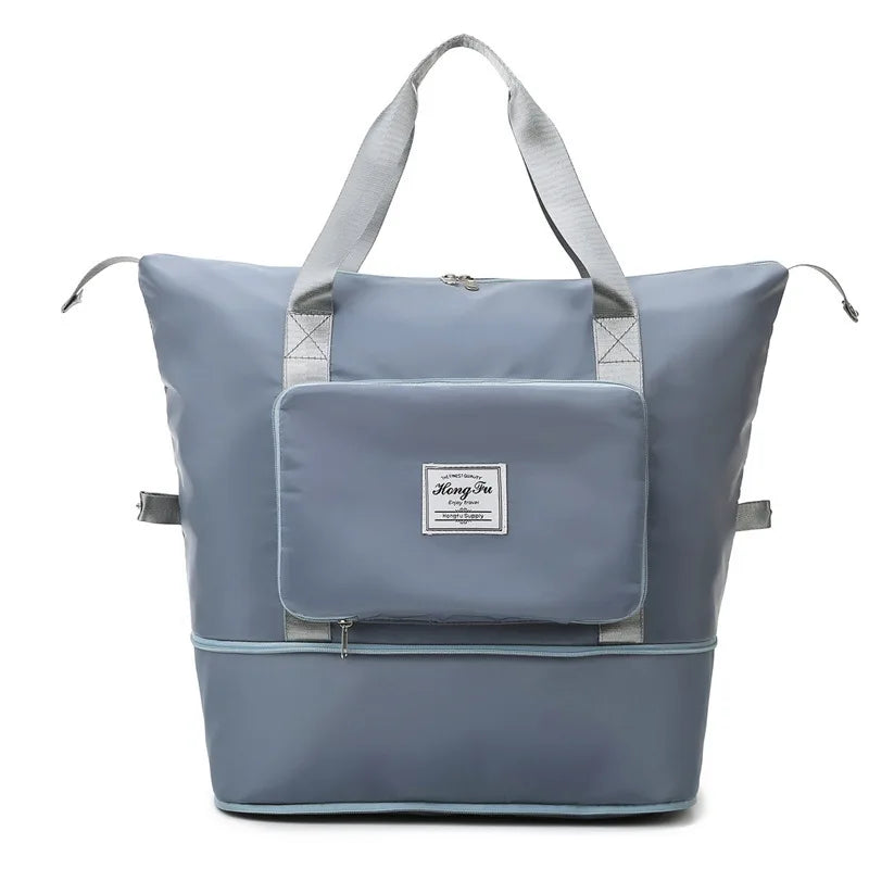 Hopfällbar unisex resväska i neutral färg, flexibel och rymlig för enkel packning och förvaring av bagage.