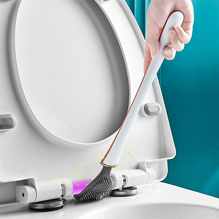Hygienisk toalettborste med modern design, väggfäste och ergonomiskt handtag för badrummet.