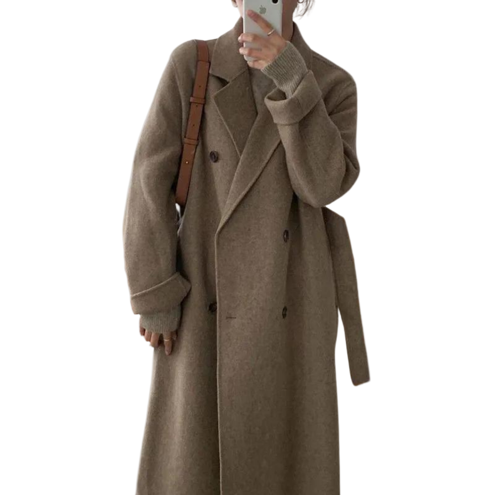 Klassisk beige vinterkappa för kvinnor, dubbelknäppt design för en tidlös och elegant look. Värmande ytterplagg.