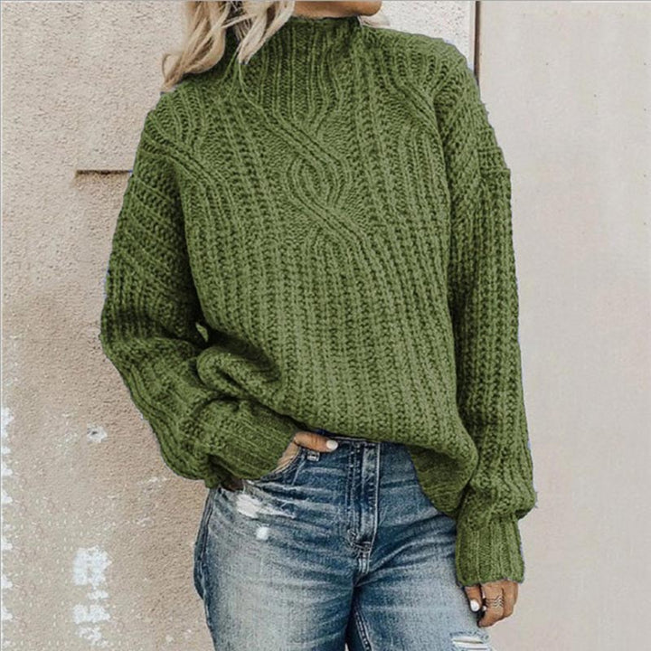 Elegant långärmad dampullover i klassisk stickning, idealisk för vardag och höstmode. Bekväm och mångsidig.