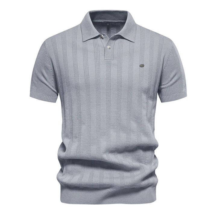 Premium herr polo skjorta, kort ärm, för en bekväm och stilren look. Perfekt för sommar och herrmode.