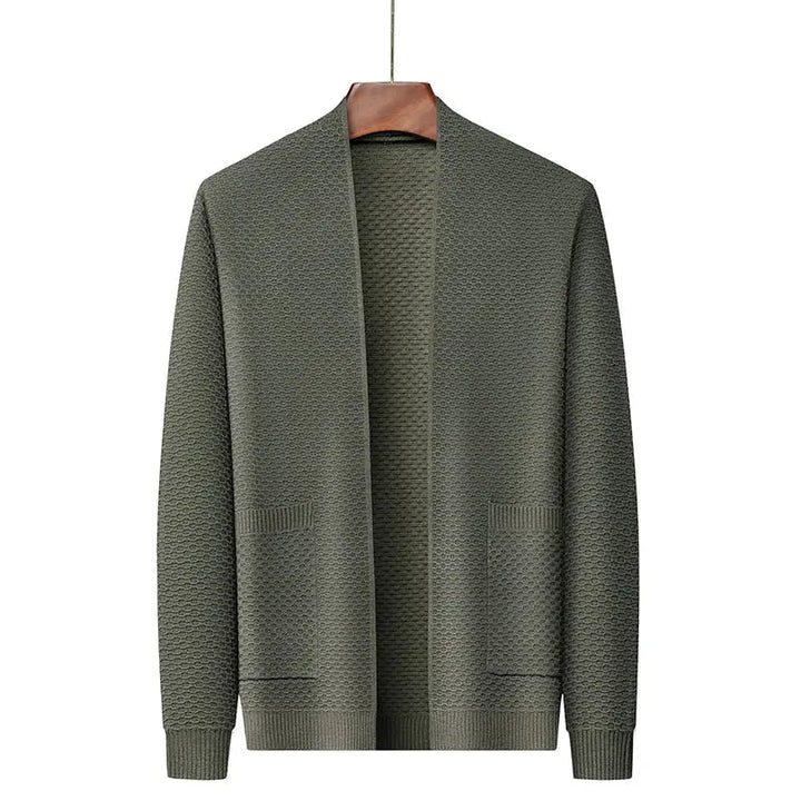 Herrblazer i jacquard, framifrån, visar dess klassiska snitt och den eleganta skräddarsydda passformen.