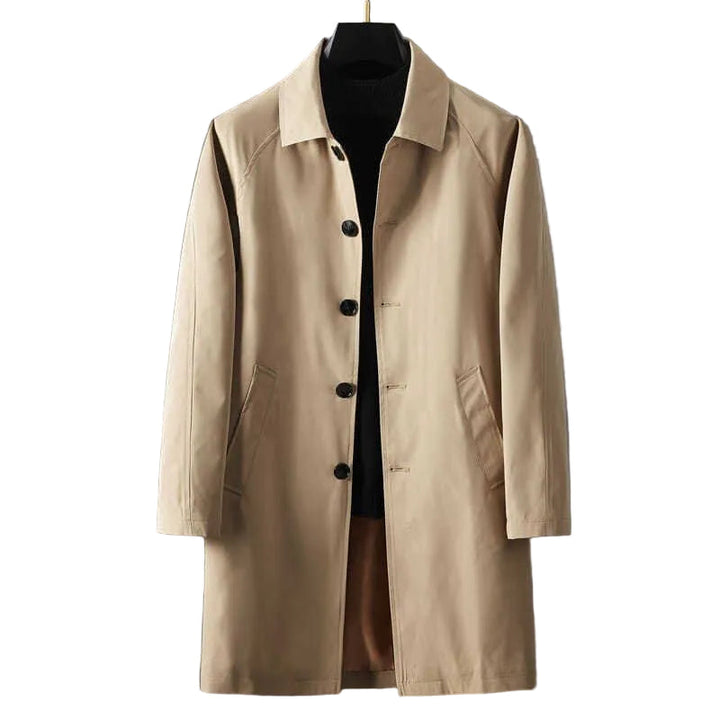Klassisk kort damtrenchcoat i beige med spridd krage, perfekt som elegant vår- eller höstjacka för kvinnor.