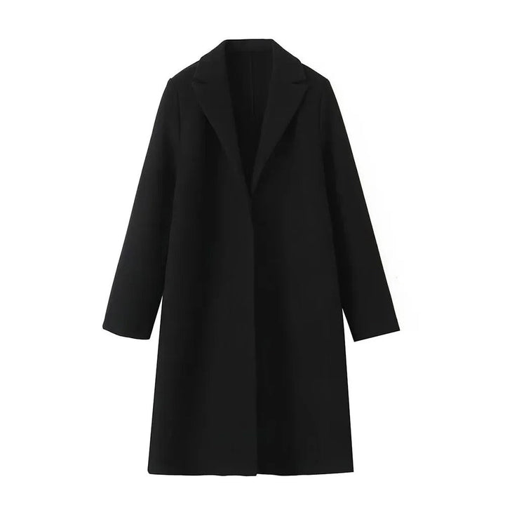 Klassisk rak damkappa, tidlös elegans i ullblandning. Perfekt ytterplagg för alla säsonger, stilren höst- och vårkappa.