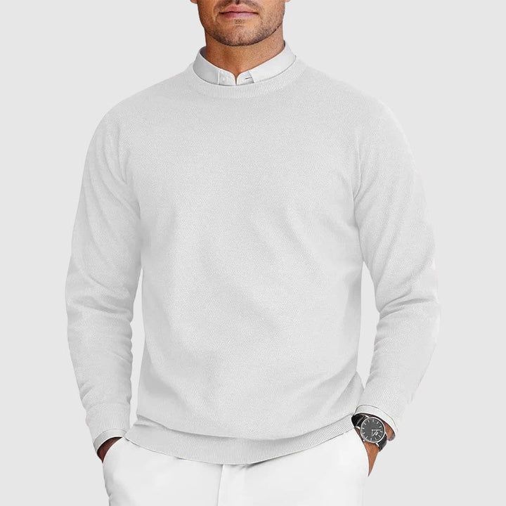 Bekväm, mångsidig herrtröja med rundhals. Perfekt för lagerpålager eller casual stil.