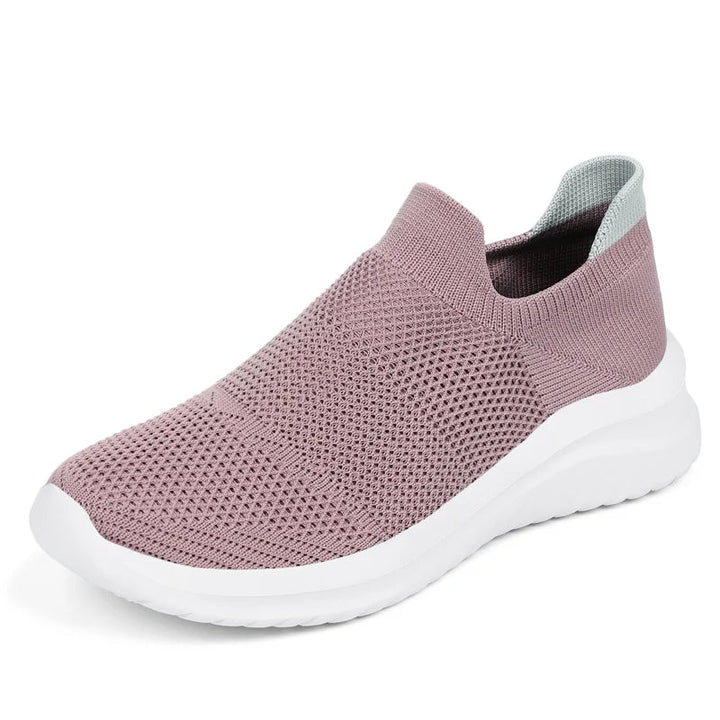 Trendiga dam sneakers med stilren design. Klassiska och bekväma skor, perfekta för moderna kvinnor.